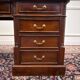 Classic English desk with green leather inlay.