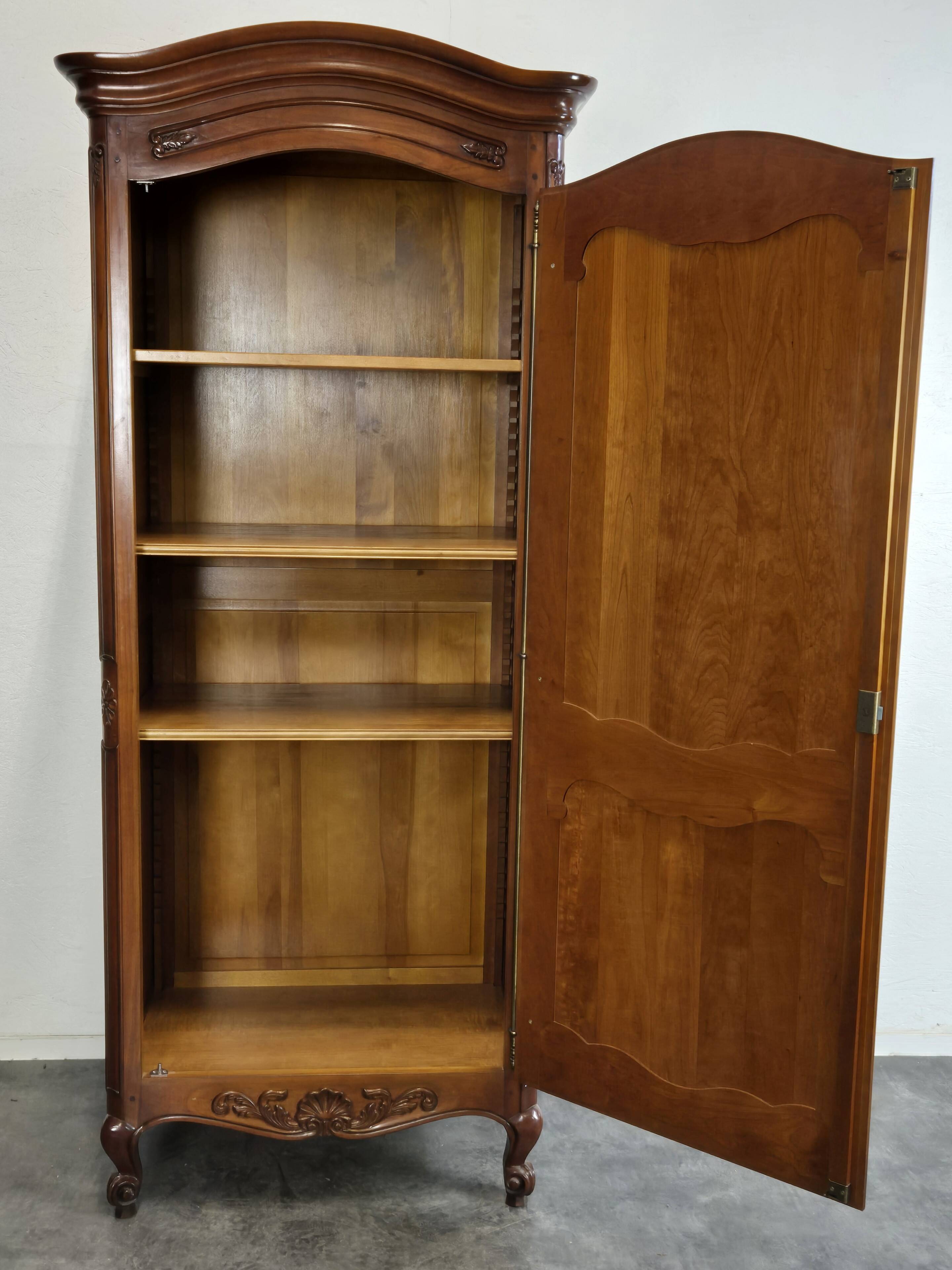 Louis Philippe style bonnetière in cherry wood