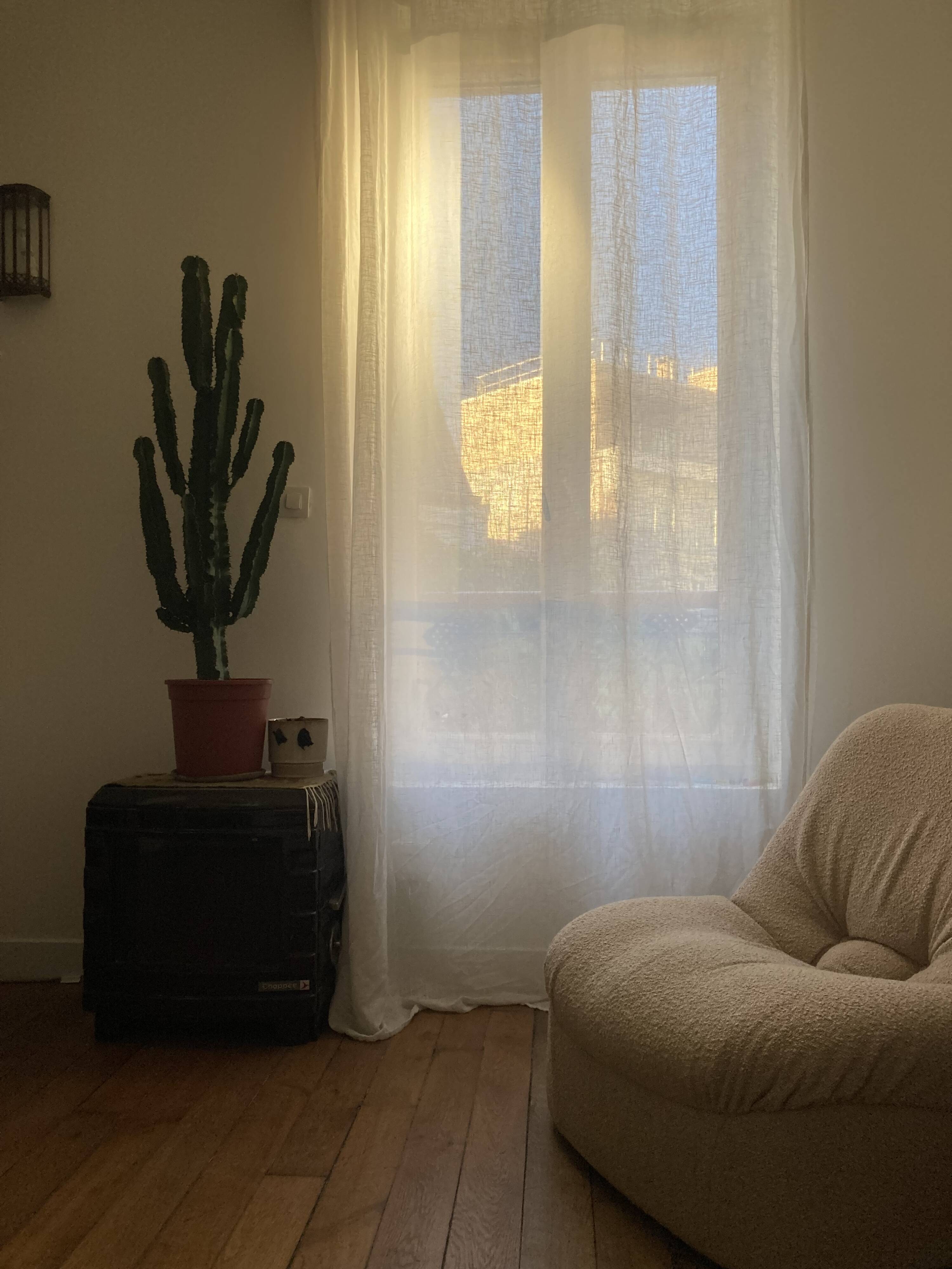 Vintage armchair reupholstered in boucle fabric.