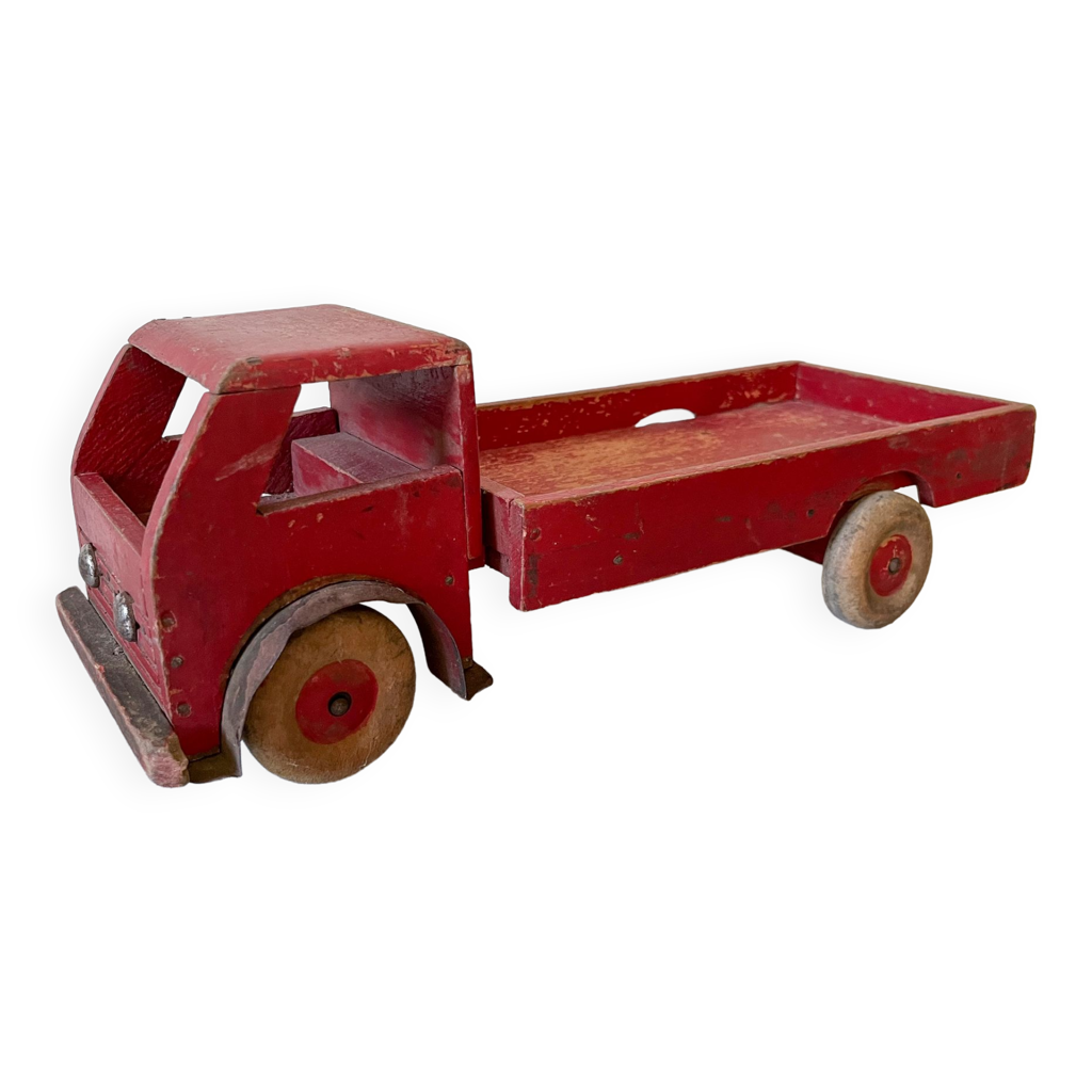 Red truck in wood and sheet metal old toy pretty vintage color