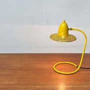 Perforated metal table lamp in Mid-Century Modern style, in the style of Mathieu Matégot, 1960s.