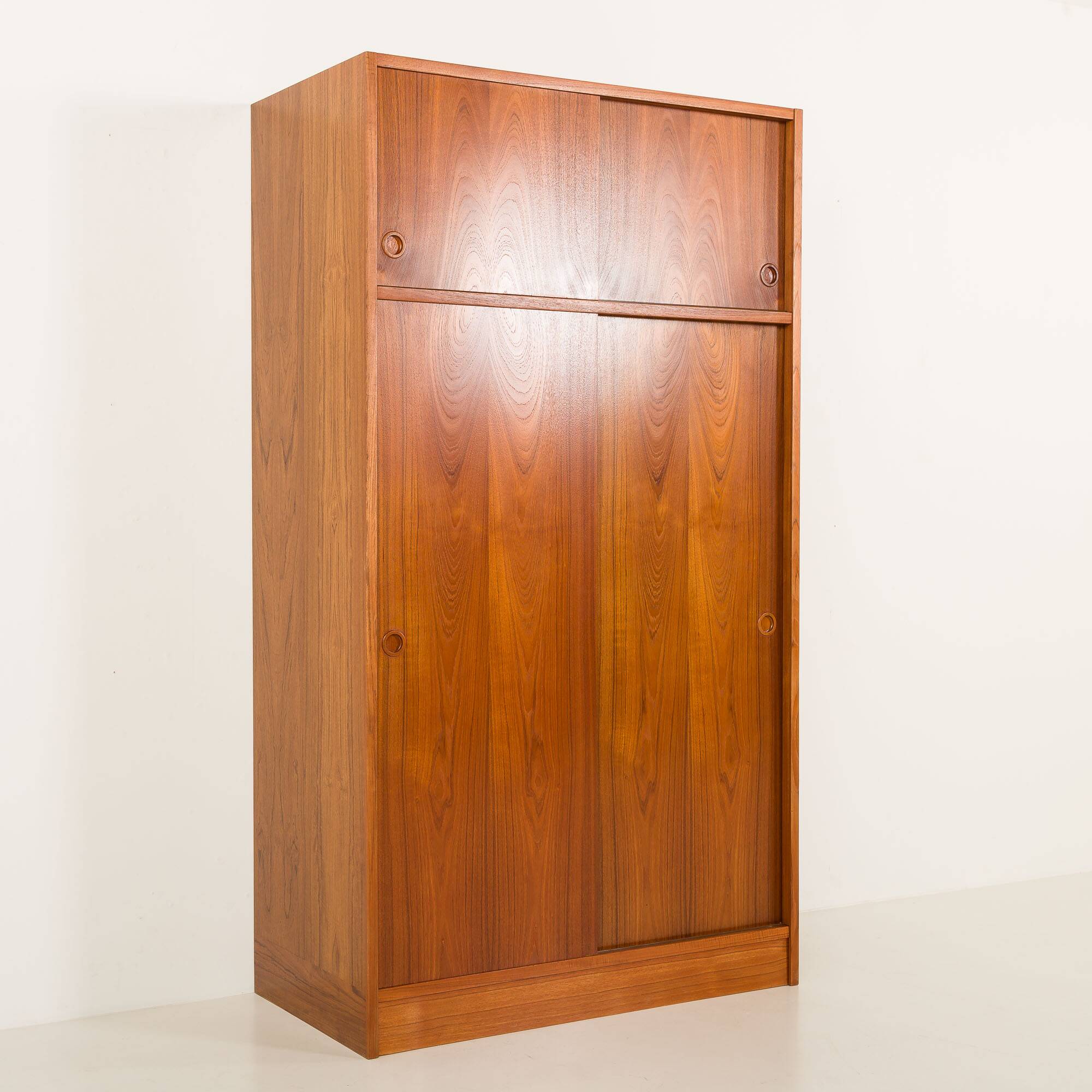 Danish teak wardrobe by Hundevad, 1960s