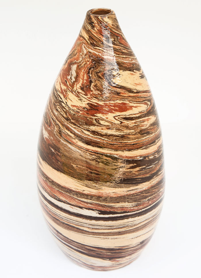 Sand, terracotta and brown soliflore vase in mixed earth