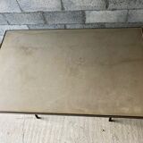 Table made of wrought iron and cement