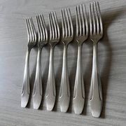 Fourchettes anciennes en métal argenté