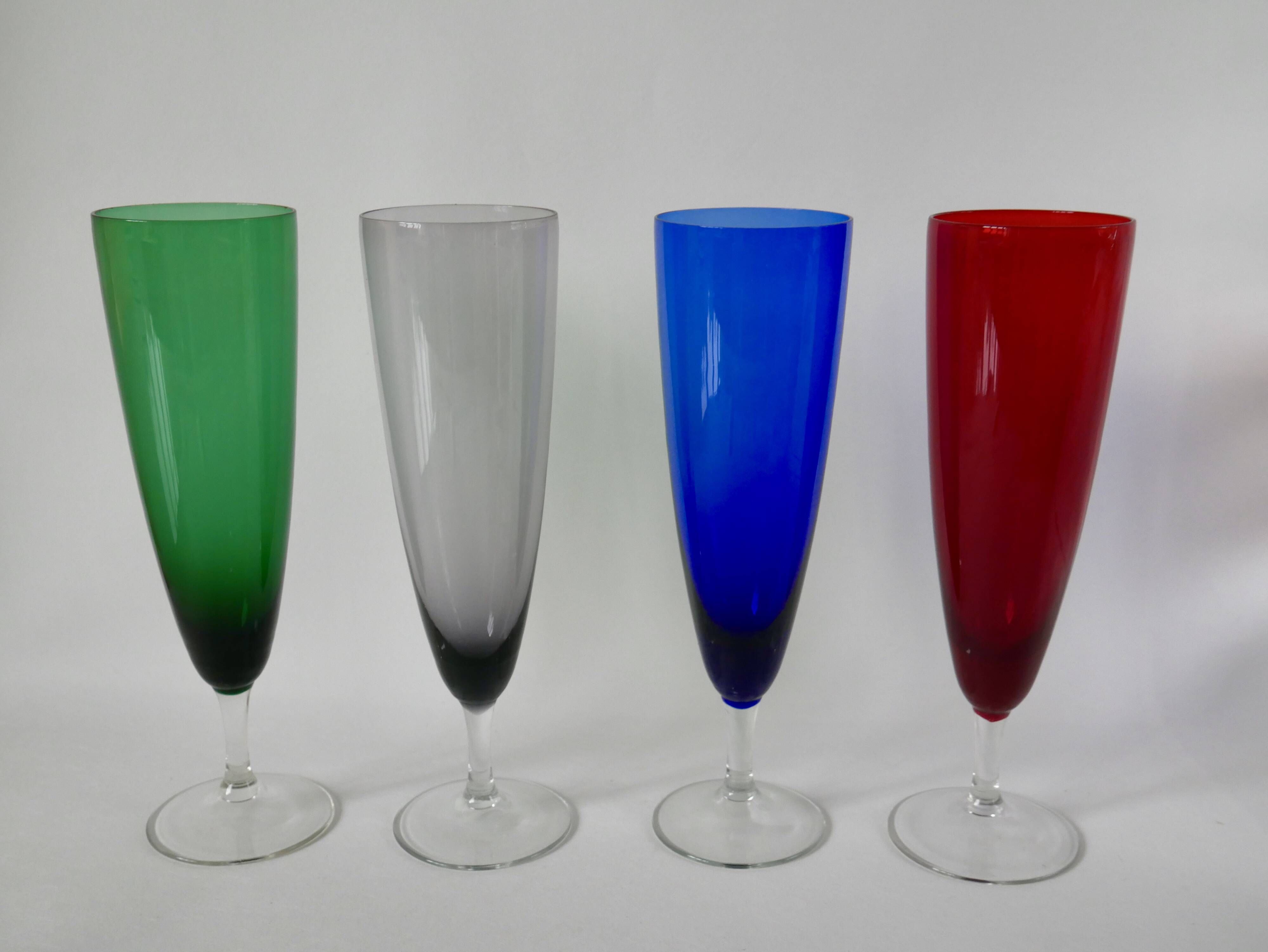 Set of 4 designer champagne flutes in colored glass from the 70s