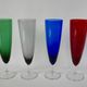 Set of 4 designer champagne flutes in colored glass from the 70s