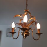 Vintage chandelier in golden metal