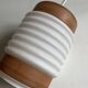Opaline corrugated tube suspension