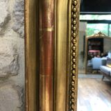 Louis-Philippe pearl mirror, presence gilding with gold leaf, mercury ice 127cm/74,5cm