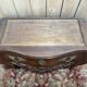 Commode sauteuse de style Louis XV en marqueterie