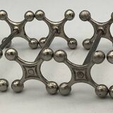 Set of 7 vintage knife rests in the shape of crosses in silver-plated metal.