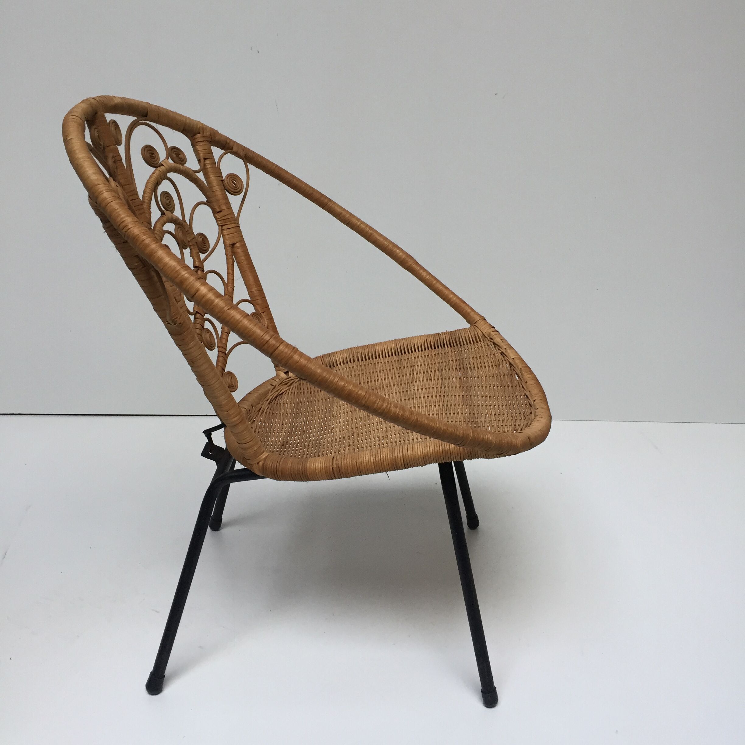 Vintage Bohemia volutes rattan chair