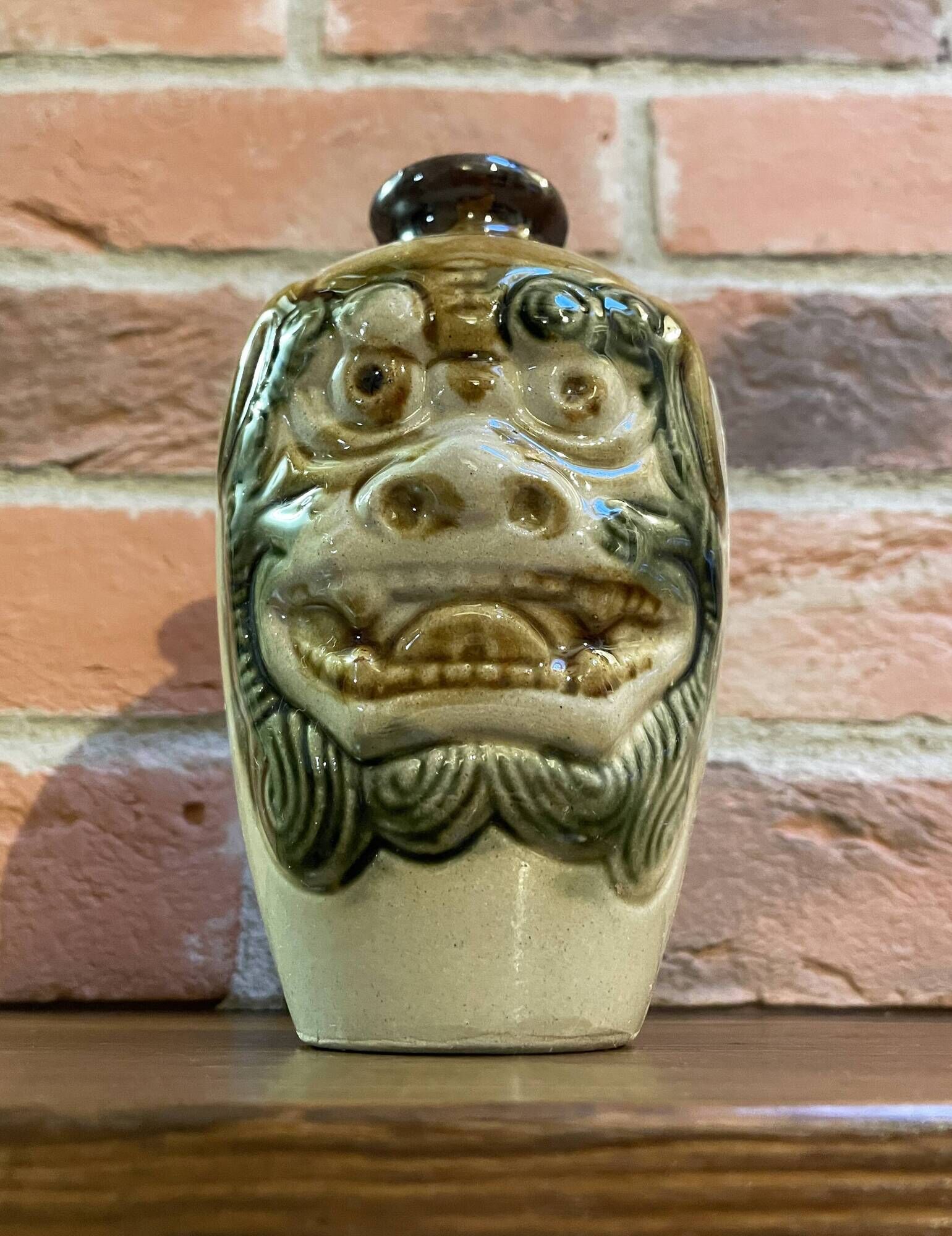 Japanese Awamori Bottle by the Helios Distillery (Okinawa) with Raised Lion and Dragon Design