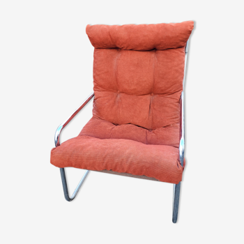 Fauteuil en velours brique