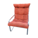 Fauteuil en velours brique