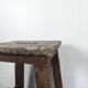 Tabouret d'atelier en bois peint brun à poignée