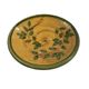 Decorative glazed terracotta plate with olive leaf pattern.