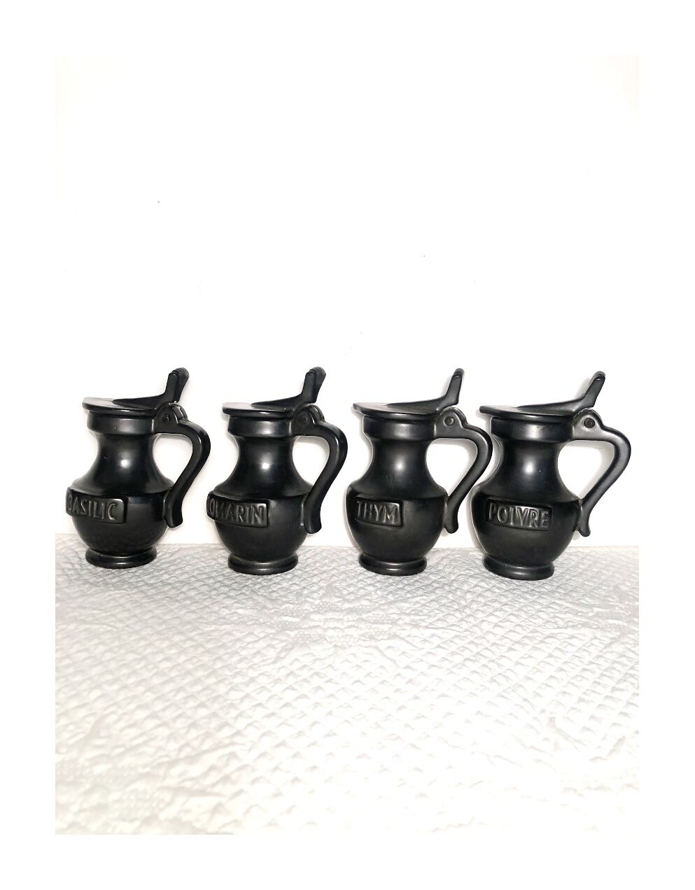 Set of vintage ceramic pitchers