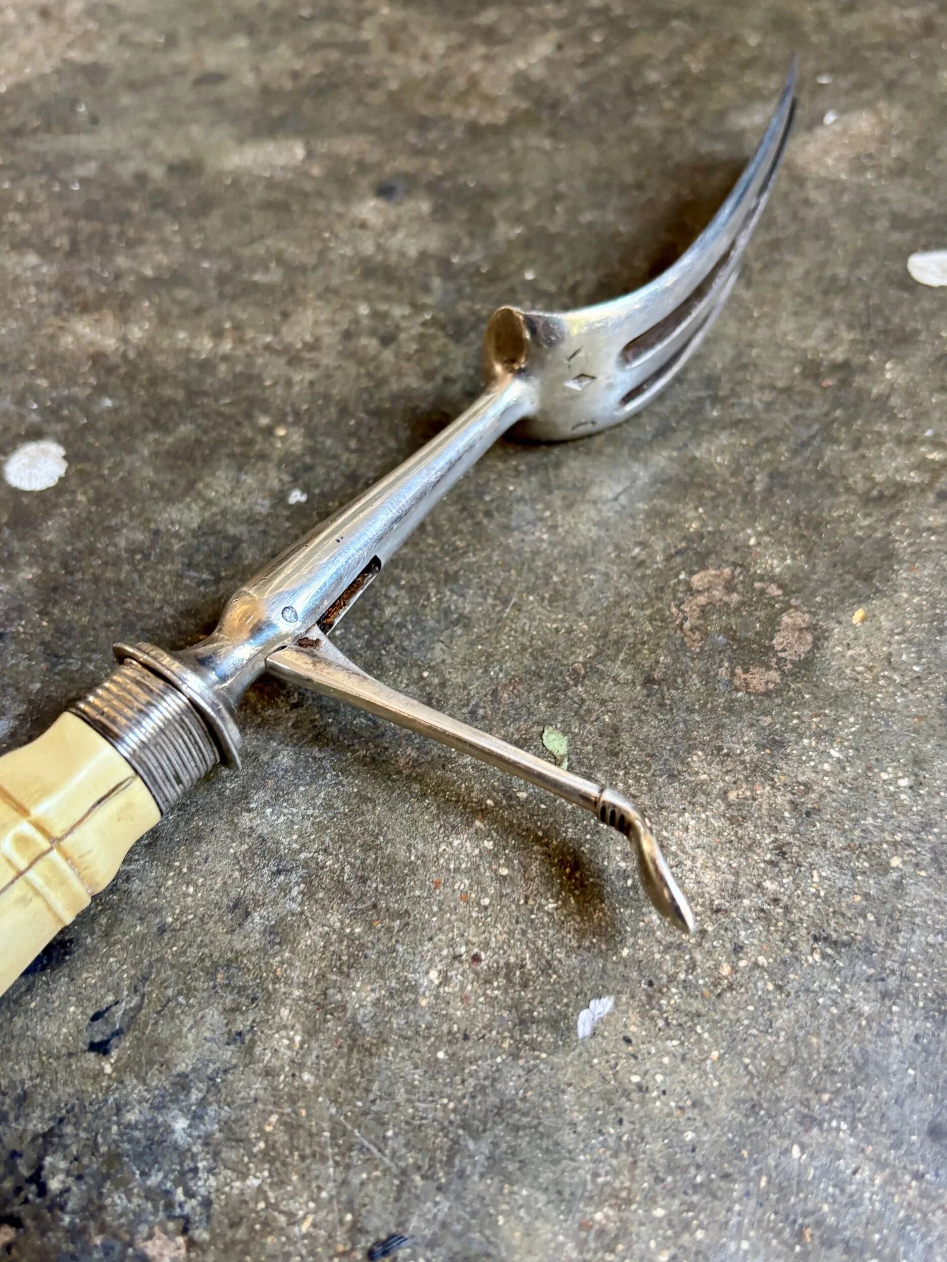 Silver and bone serving fork