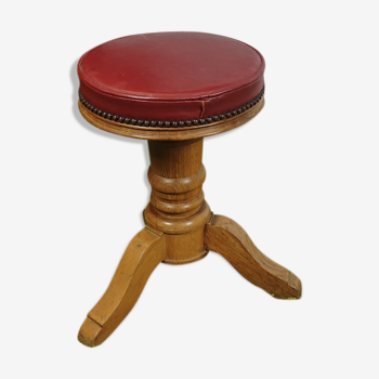 Red leather adjustable piano stool