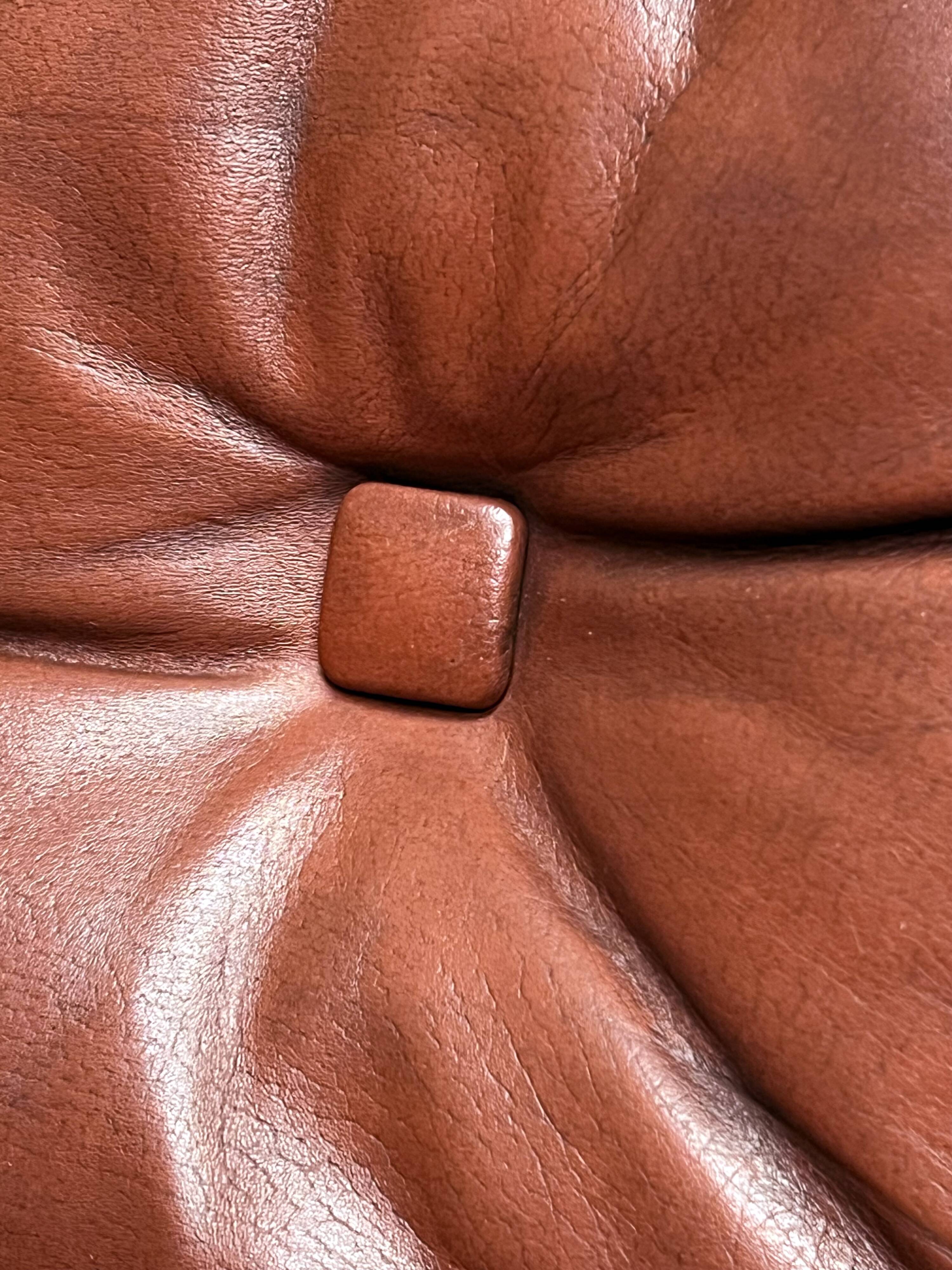 Pair of leather lounge chairs