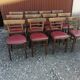 Lot de 12 chaises bistrot TON en bois et skaï rouge vintage.