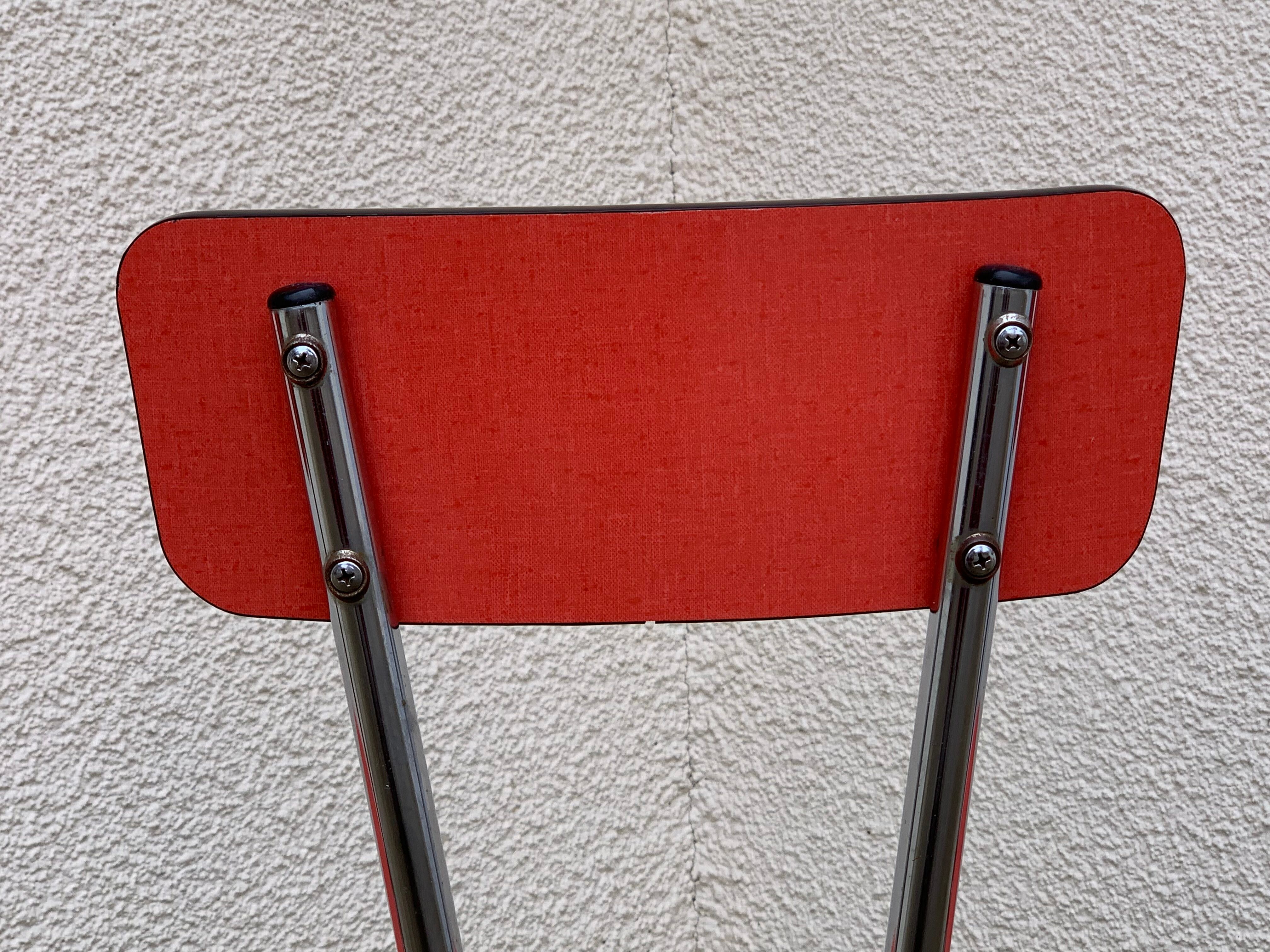 Red formica chairs 1950