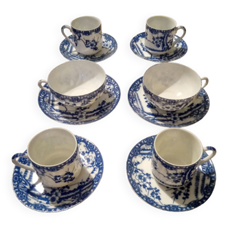 Blue and white Japanese porcelain coffee and tea cups cherry blossom pattern and Japanese woman