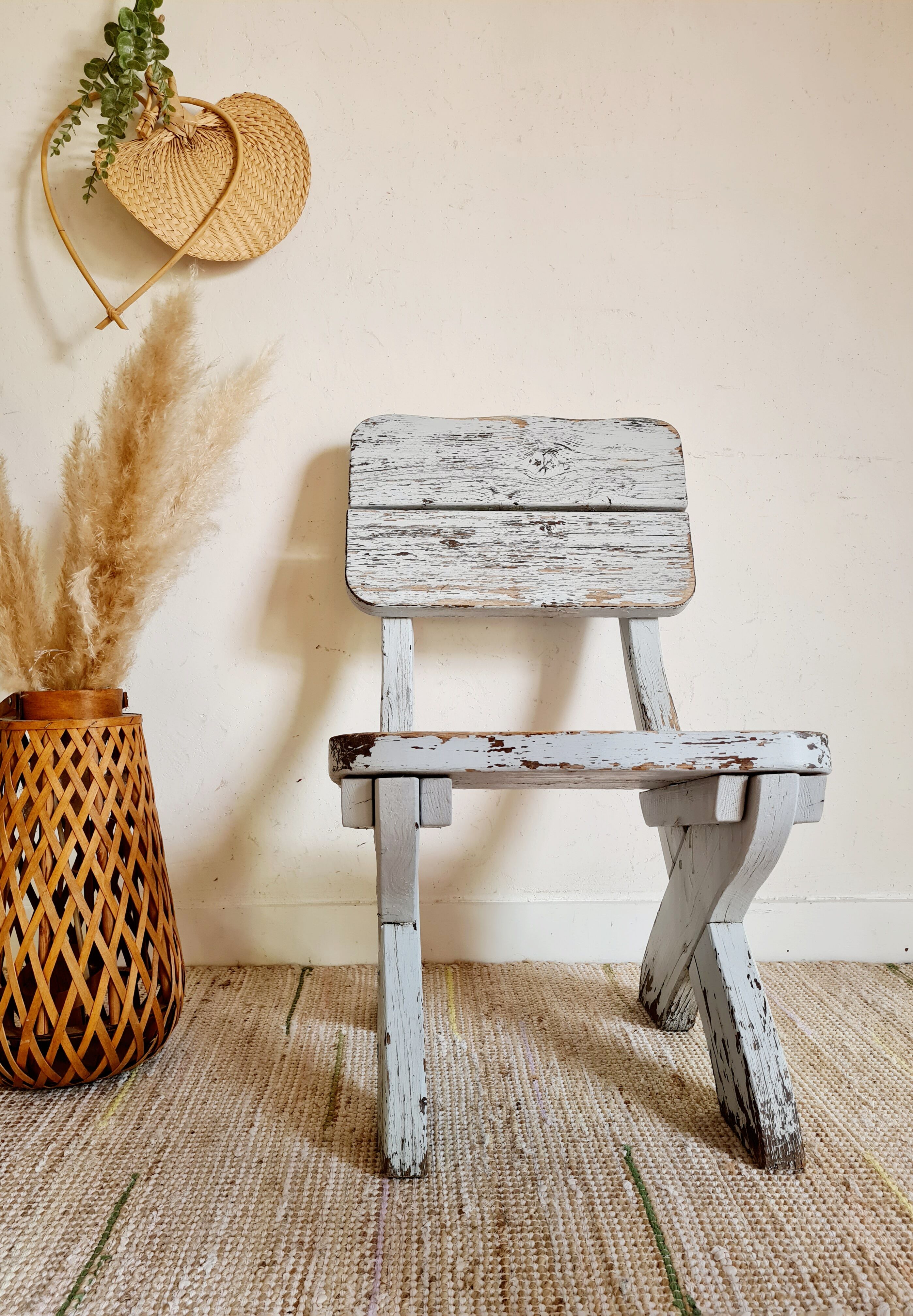 Patinated white old garden chair