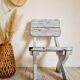 Patinated white old garden chair
