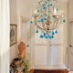 Italian chandelier with blue beads and gilded wood.