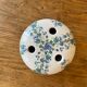 Ceramic flower pique