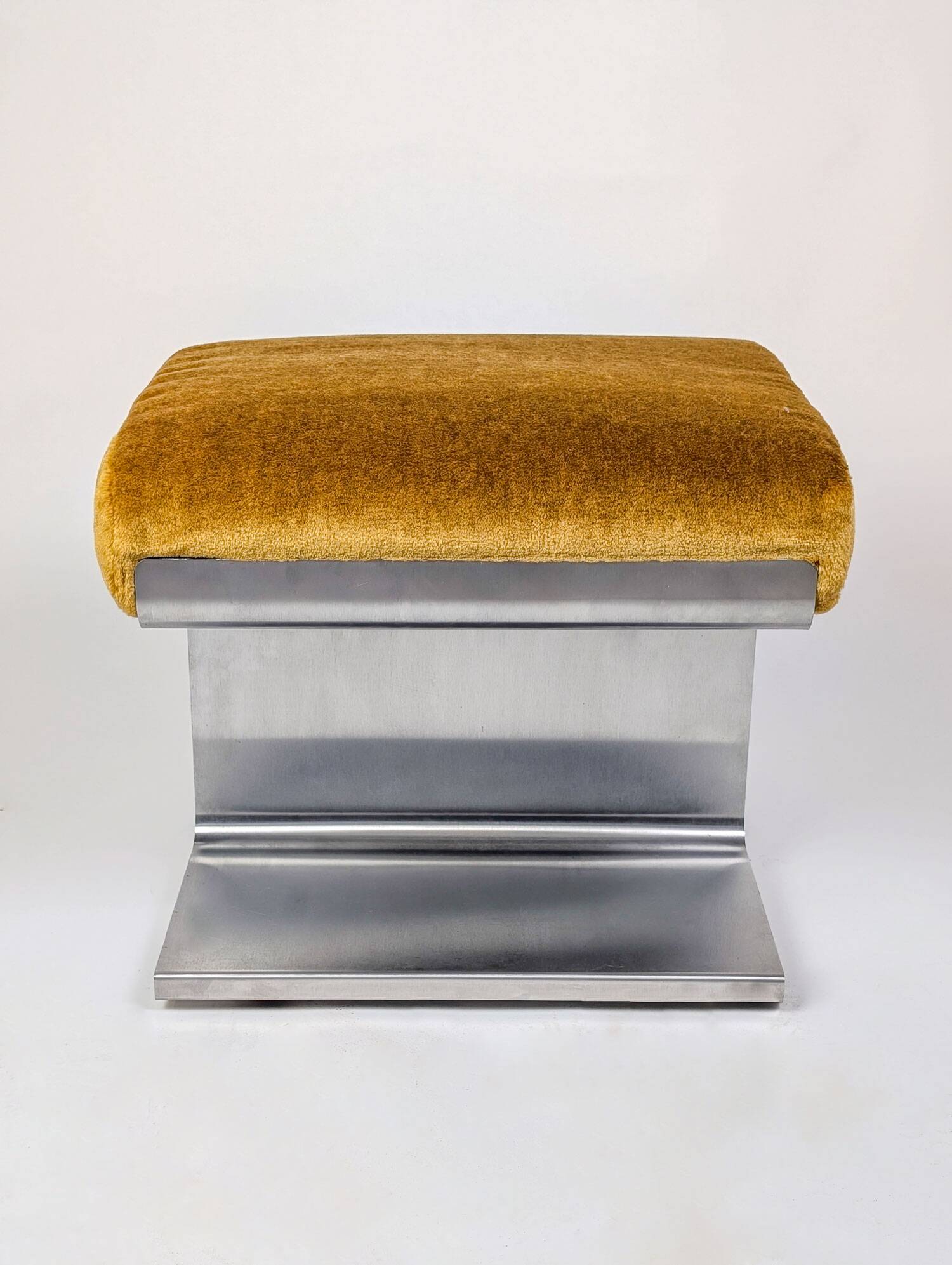 Stainless steel coffee table and stool, by the Roche Bobois design office, 1970