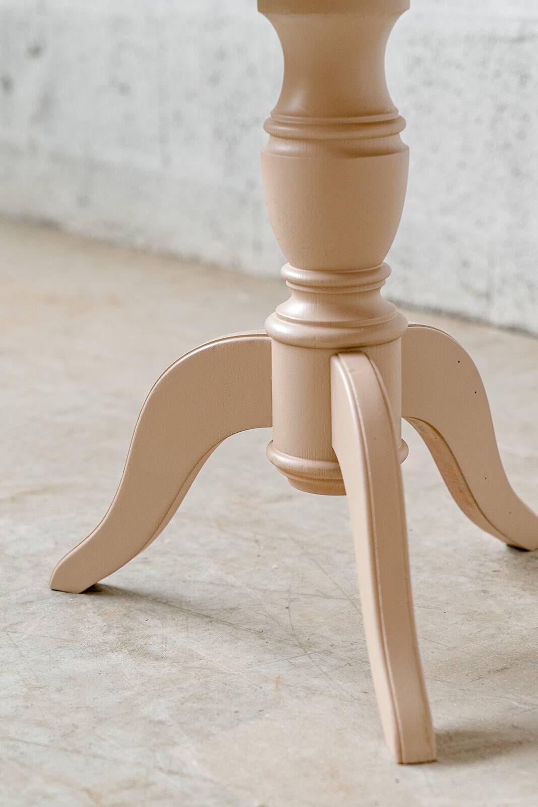 Old wooden pedestal table