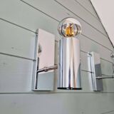 Pair of tubular wall sconces in chrome metal, 1970.