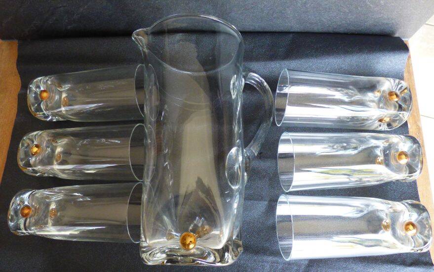 Vintage orangeade service with a jug and 6 glasses decorated with golden beads.