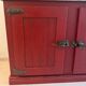 Low red "Guérande" buffet, zinc top, butcher's fridge-style doors