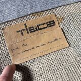 Hand-knotted wool rug by Tisca with a geometric pattern, signed "ILES", France, 1990s.