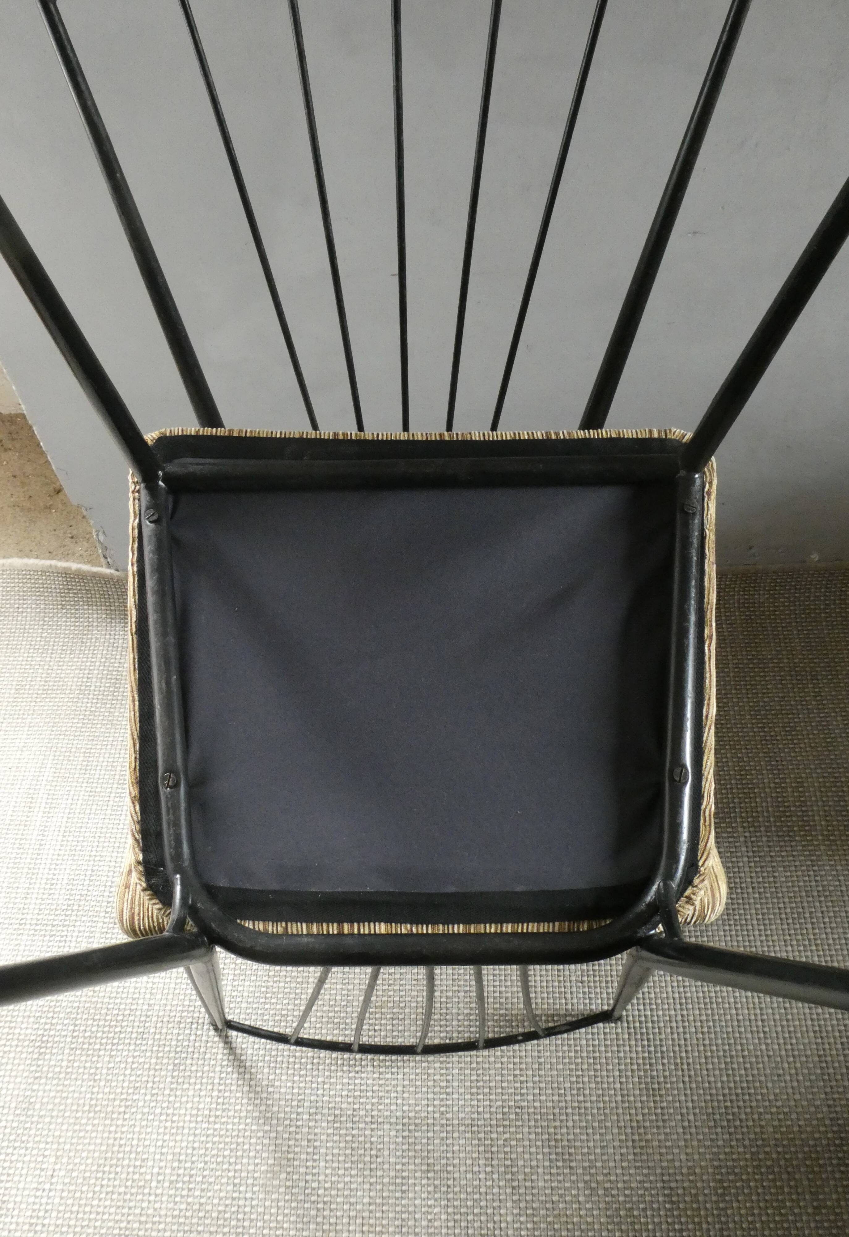 Pair of Colette Gueden chairs, black metal and fabric.