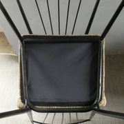 Pair of Colette Gueden chairs, black metal and fabric.
