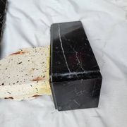 Pompadour fireplace with black marble modillions