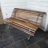 Old cast iron garden bench with oak slats