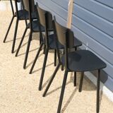 4 black metal and wood chairs