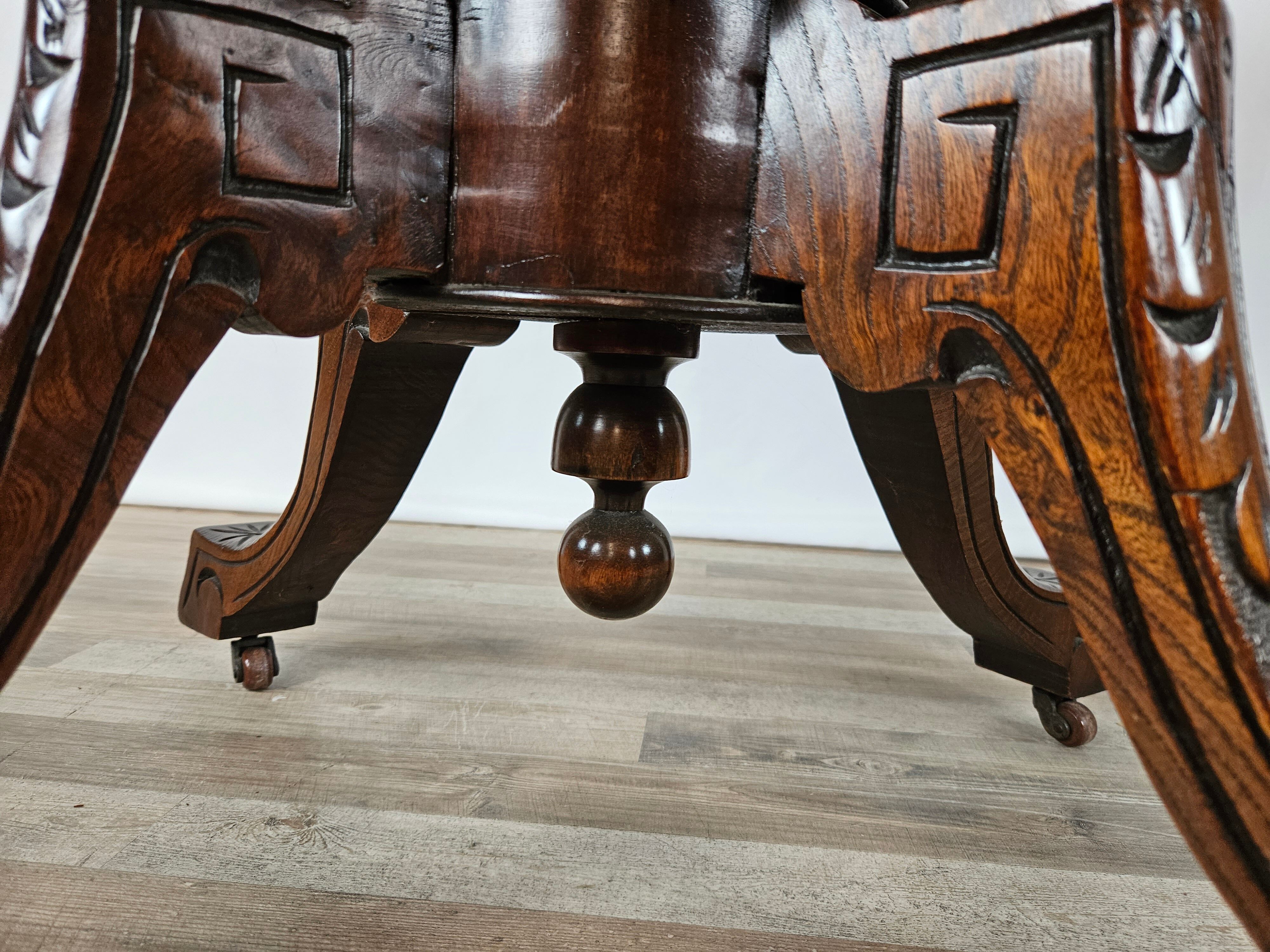 Coffee table in walnut with maple inlays and wheels