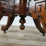 Coffee table in walnut with maple inlays and wheels