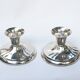 Pair of silver metal candlesticks