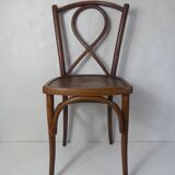 Old curved wooden bistro chair