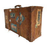 suitcase of leather with labels of palaces