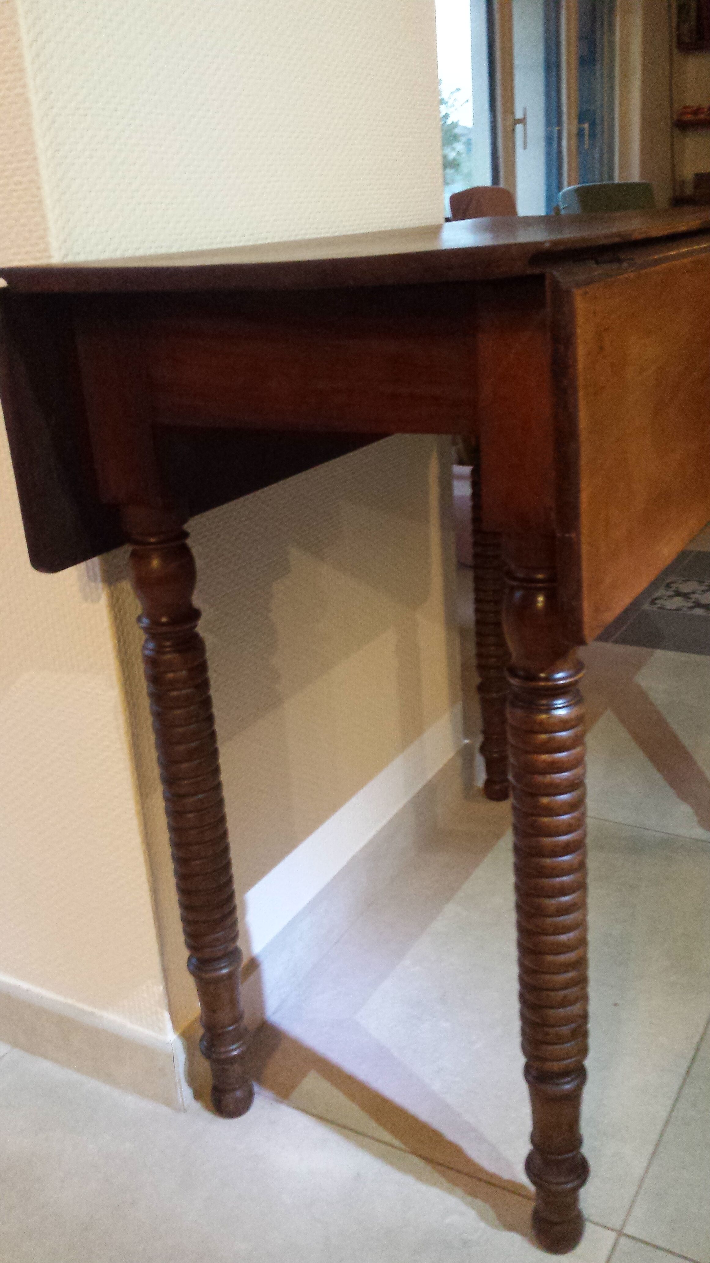 Wooden table with extensions